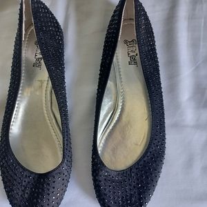 Brash rhinestone slippers